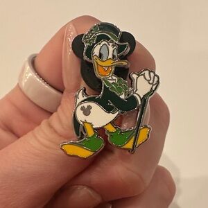 2025 WDW Hidden Disney Pin featuring Donald Duck dressed for St. Patrick's Day